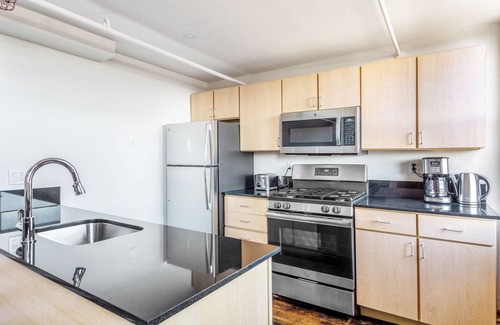 South End Casa | Two-level South End Loft w/ Pool, Art Gallery, Steps to T by Blueground