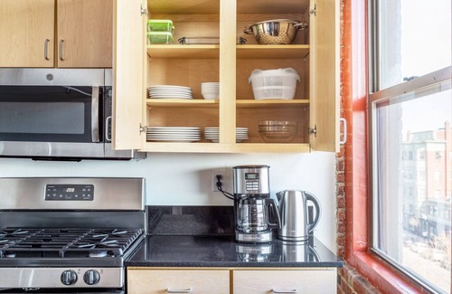 South End Casa | Two-level South End Loft w/ Pool, Art Gallery, Steps to T by Blueground