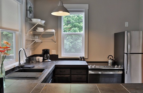 Langley Condominio | Two-story townhouse just steps from the waters edge with a private deck. Perfect accommodations for families. Recently remodeled. Beautifully appointed