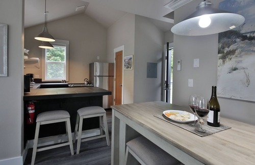 Langley Condominio | Two-story townhouse just steps from the waters edge with a private deck. Perfect accommodations for families. Recently remodeled. Beautifully appointed
