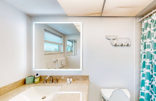 Capri Isle Casa | Two-story waterfront retreat with dock, pool, central AC, fireplace, & fast WiFi
