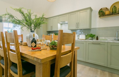 Bodorgan Cabaña | Ty Cadwgan - a cosy fire that sleeps 4 guests in 2 bedrooms