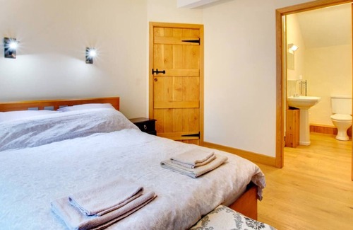 Dolgellau Casa | Una casa aislada que disfruta del ambiente tranquilo que rodea Cadair Idris. Bien amueblado, este