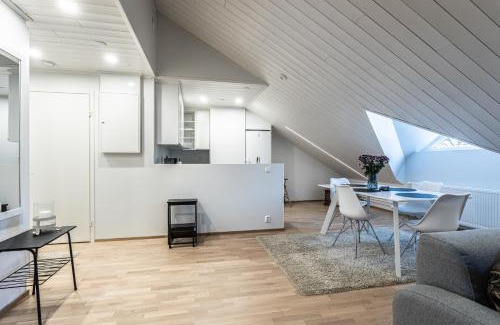 Downtown Kuopio Apartamento | Tyylikäs ja tilava kattohuoneisto ydinkeskustassa