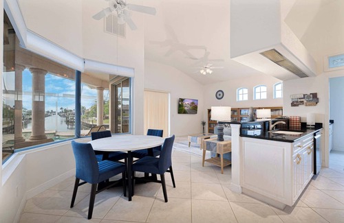 Eight Lakes Casa | Ultimate Open Waterfront Home Sailboat Gulf Access Heated Pool