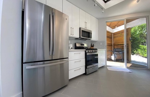 Winding Bay Casa | ULTRA LUX Coconut Cove Compound! 2.5 acres with 300 ft PINK SAND BEACH