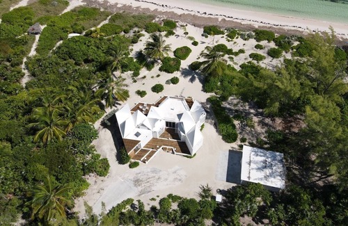 Winding Bay Casa | ULTRA LUX Coconut Cove Compound! 2.5 acres with 300 ft PINK SAND BEACH