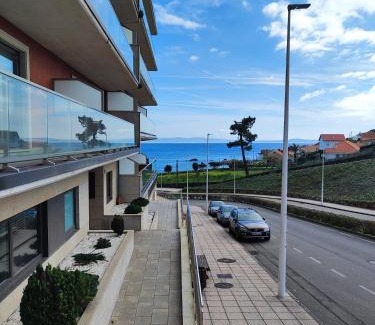 Dean Pequeno Apartamento | Un rincón con vistas a la Ría, playa y parking.