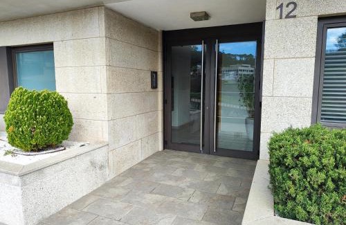 Dean Pequeno Apartamento | Un rincón con vistas a la Ría, playa y parking.