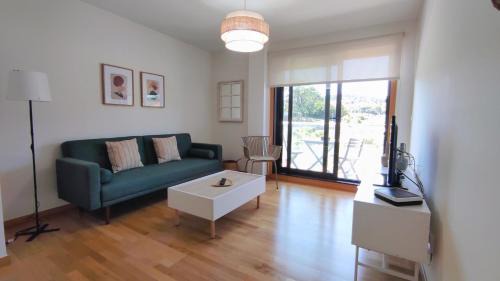 Dean Pequeno Apartamento | Un rincón con vistas a la Ría, playa y parking.