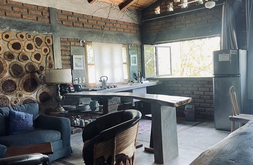 Sayulita Cabina | Unique artsy cabin, large window views