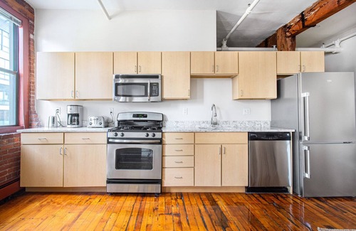 South End Casa | Unique South End Loft w/ Pool, Art Gallery, Steps to T by Blueground