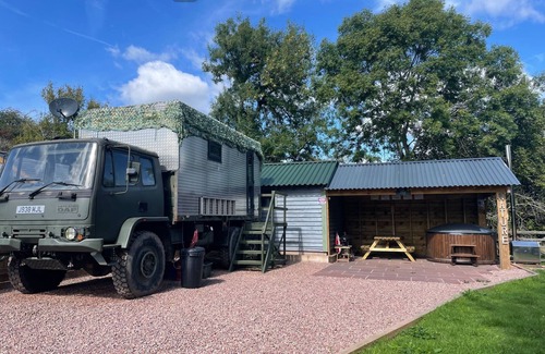Usk Casa | Unique stay in your very own army truck. Sleeps 4. Hot tub. Tranquil setting.
