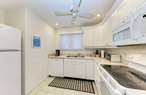 Longboat Key Condominio | 110 Sand Cay Beach Resort Vista a la piscina y al jardín