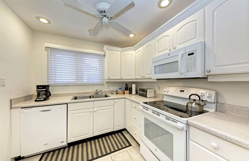 Longboat Key Condominio | 110 Sand Cay Beach Resort Vista a la piscina y al jardín