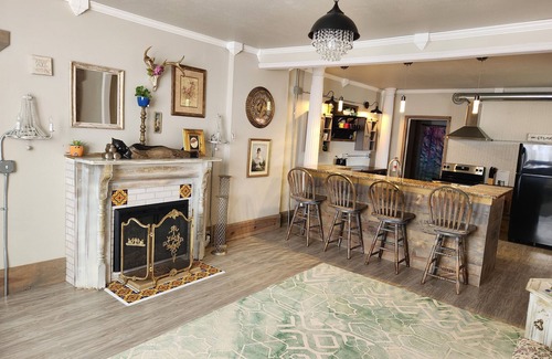 Lansing Casa | Unwind at the Lotus house Opal suite.