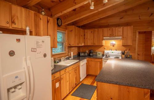 Fleetwood Casa | Updated Cabin with 2 primary suites, hot tub, spacious covered porch
