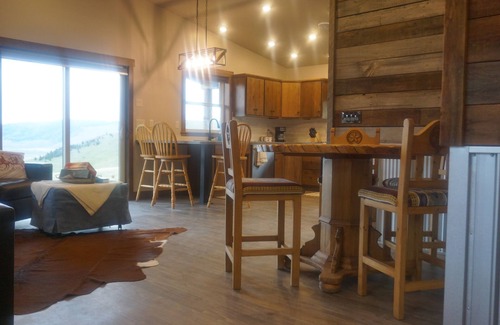 Glacier Country Cabina | Upscale cabin, 10000 acre cattle ranch. Views, abundant wildlife & hiking.