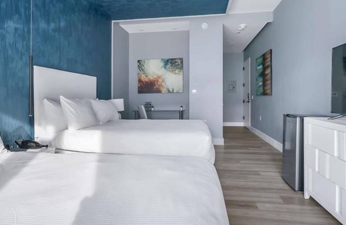 Mott Haven Casa | Upscale Double Queen Suite | Mott Haven | Fitness Center | Free WiFi