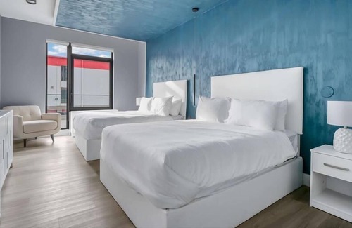 Mott Haven Casa | Upscale Double Queen Suite | Mott Haven | Fitness Center | Free WiFi