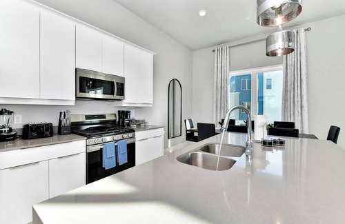 Reunion Hotel | Spacious Modern Condo with Pool Table, Rooftop Terrace & Large Loft. Reunion Resort Water Park Access near Disney at Spectrum Resort Orlando by Rentyl - B18 #229