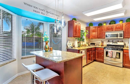 Tropic Casa | Urban Oasis W/hot Tub, Heated Pool And Private Movie Theater 2 Bedroom Home by RedAwning