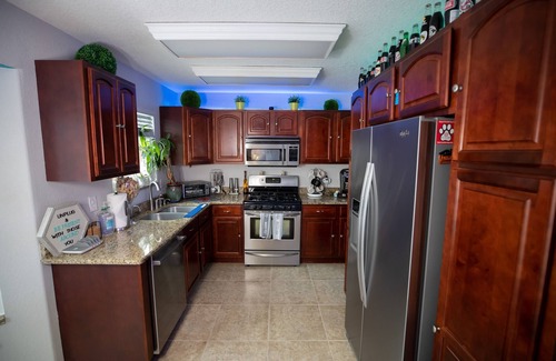 Tropic Casa | Urban Oasis W/hot Tub, Heated Pool And Private Movie Theater 2 Bedroom Home by RedAwning