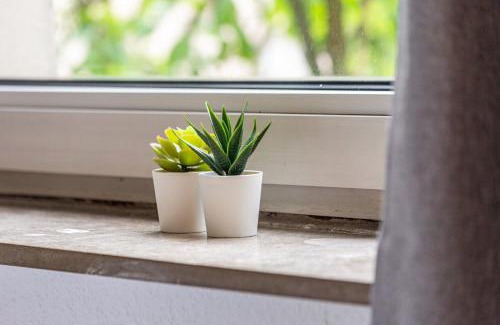 Blumenviertel Apartamento | Urbanes Nest, ideal für Entdecker