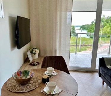 Augustow Apartamento | Urokliwy Apartament z dużym tarasem i widokiem na Jezioro Białe