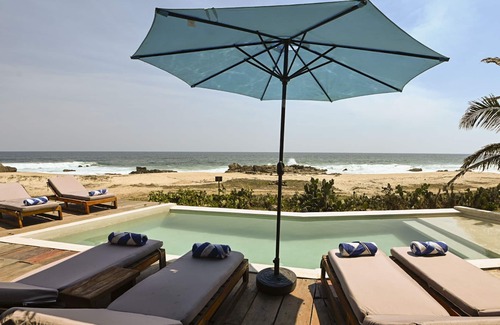 Santa María Tonameca Villa | UtopiAmar Las Palmas: a design beach room in a spectacular front beach setting.