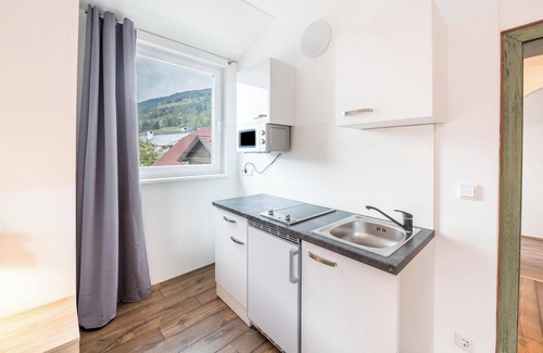 Sankt Martin Apartamento | Apartamento de vacaciones "Mentenwirt Suite" con vistas a la montaña, Wi-Fi y terraza