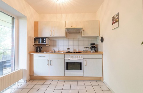 Wremen Apartamento | Vacation apartment "Buhne 32" Lilli Marleen 3-32, peaceful and with a sunny balcony.