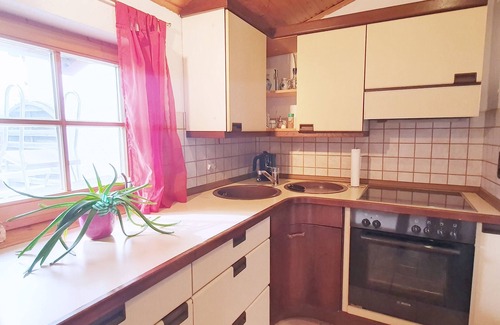 Reifing Apartamento | Apartamento de 54 metros cuadrados, f. 1-3 pers., Con una amplia terraza, piscina exterior, césped.
