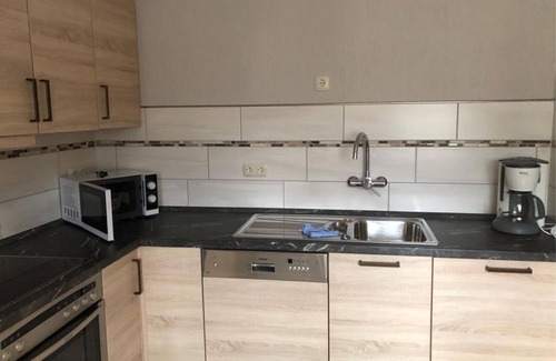 Altenkirchen Apartamento | Vacation apartment with spacious sunbathing lawn - Ferienwohnung Hombitz