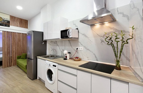 Playa de Arinaga Apartamento | Vacation Apartment "Gofiobeach" with Private Terrace, Wi-Fi and Air Conditioning