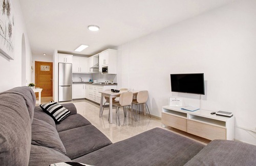 El Medano Apartamento | Apartamento de vacaciones 'La Perla D22 En El Médano' con piscina compartida, balcón y Wi-Fi