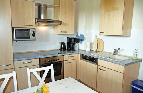 Ralswiek Apartamento | Vacation apartment with sitting area in the garden on the Bodden in Ralswiek - Holiday apartment with