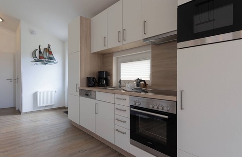 Dorumer Neufeld Casa | Vacation home Wattkrabbe. Charming and inviting.