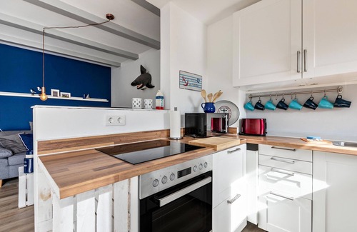 Busumer Deichhausen Casa | Casa de vacaciones "Deich Hus" con terraza privada, jardín y Wi-Fi