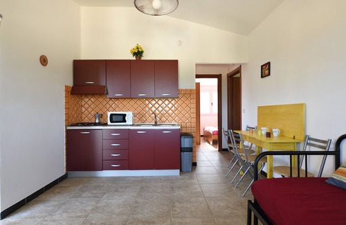 Tertenia Casa | "Appartamento Sole 1" con vistas al mar, jardín y aire acondicionado; mascotas permitidas