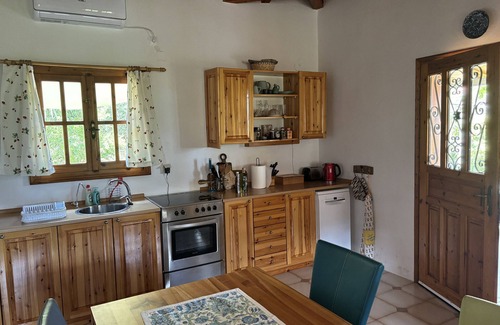 Vasilitsion Casa | Casa de vacaciones "Divas Gartenhaus" con vistas al mar, a la montaña y al pueblo