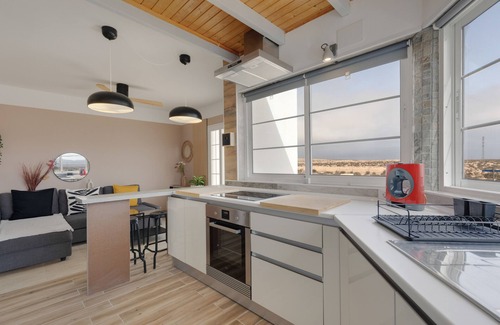 Bahia Calma Casa | Casa de vacaciones 'Las Arenas Family' con vistas a la montaña, terraza privada y Wi-Fi