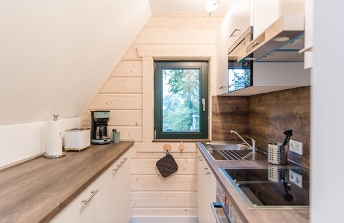 Eslohe Casa | Casa de vacaciones "Log Cabin 1 con vistas a la montaña", terraza privada y Wi-Fi en Sauerland
