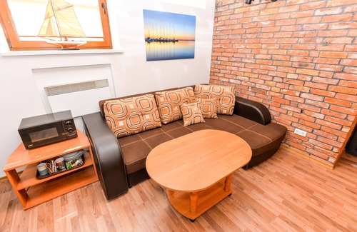 Nida Casa | Casa de vacaciones "Nidos Gaiva" habitación triple con sofá cama