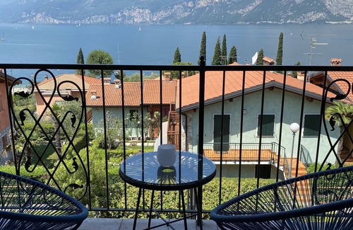 Assenza Casa | Vacation home with private garden, lake and mountain views near the eastern shore of the lake.