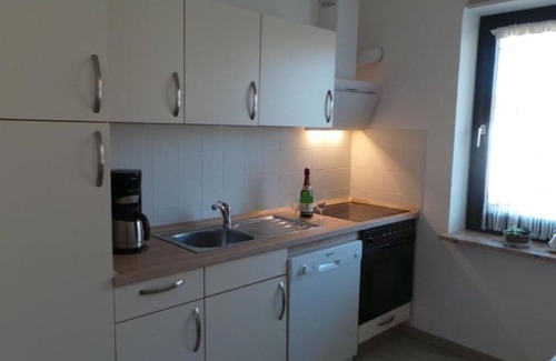 Berumerfehn Apartamento | Vacation in a thatched roof house