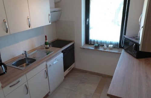 Berumerfehn Apartamento | Vacation in a thatched roof house