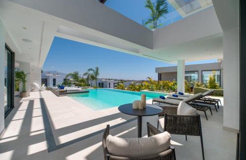 Nueva Milla de Oro Villa | VACATION MARBELLA I Villa Hanami, Private Infinity Edge-Pool, Gym, Movie Theater, Close to Golfs and Beaches