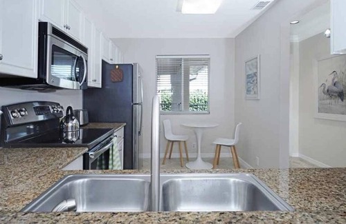 North Naples Condominio | Paraíso de vacaciones en "SUNSET TIDES" Emerald Lakes en North Naples!