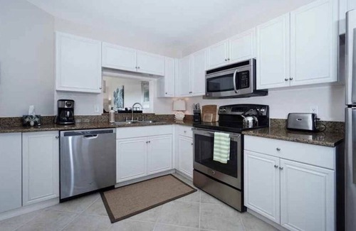 North Naples Condominio | Paraíso de vacaciones en "SUNSET TIDES" Emerald Lakes en North Naples!